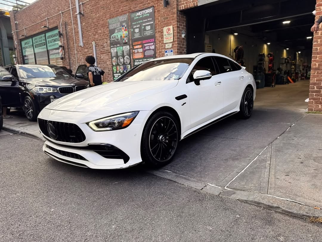 White Mercedes-AMG GT 4-door at ENY Motors