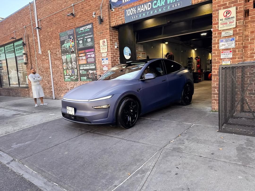 Blue Tesla Model 3 at ENY Motors