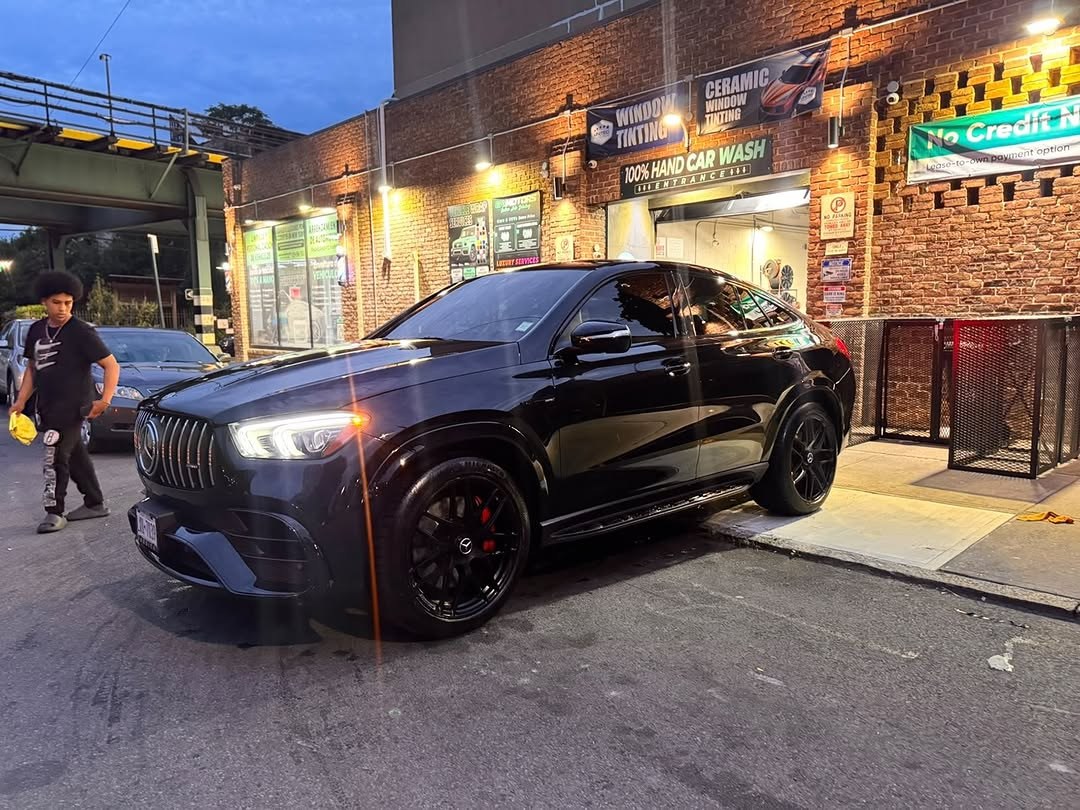 Black Mercedes-Benz GLC coupe at night at ENY Motors